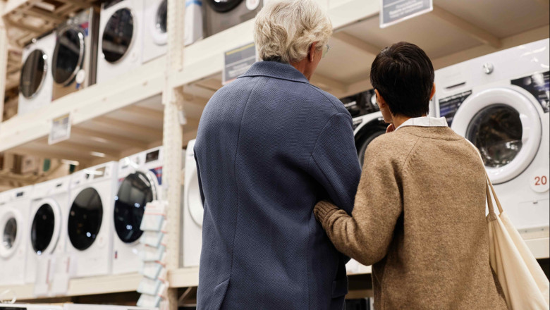 back view of senior couple in household appliances 2023 11 27 05 36 14 utc compressed back view of senior couple in household appliances 2023 11 27 05 36 14 utc compressed