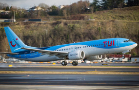 dl tui ag plc tour operator package holidays charters boeing 787 aircraft plane logo ftse 250