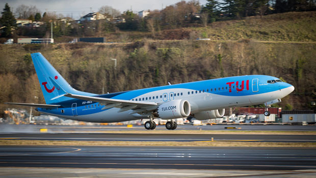 dl tui ag plc tour operator package holidays charters boeing 787 aircraft plane logo ftse 250