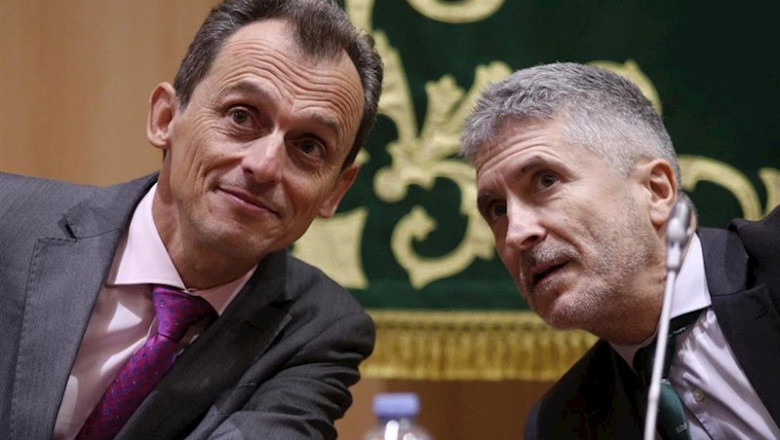 ep los ministros pedro duque y fernando grande-marlaska en unas jornadas de la guardia civil en 2019