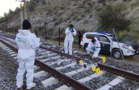 ep agentes de la guardia civil inspeccionan la via del tren donde descarrilaron dos trenes de alta