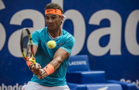 ep rafael nadal golpea un reves durante su partido ante david ferrer en el godo