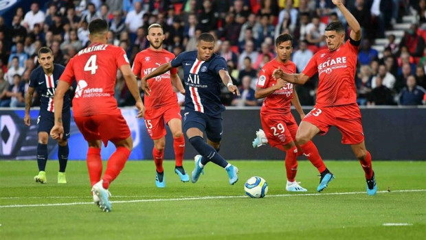 ep 11 august 2019 france paris paris saint-germains killian mbappe c battles for the ball with nimes