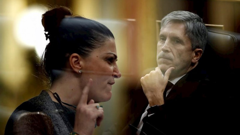Multiexposición de la diputada de Vox Macarena Olona y el ministro del Interior, Fernando Grande-Marlaska, durante el pleno celebrado este miércoles en el Congreso | Pool ep multiexposicion de la diputada de vox macarena olona y el ministro del interior fernando