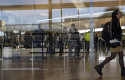 ep archivo   un grupo de personas en el aeropuerto de barcelona