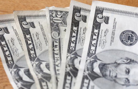 ep filed - 19 february 2016 hamburg bank notes of the us dollar lying on a table the ep filed - 19 february 2016 hamburg bank notes of the us dollar lying on a table the