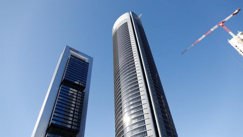 ep torres cepsa y pwc junto a la torre caleido en madrid cuyas obras de construccion continuan a ep torres cepsa y pwc junto a la torre caleido en madrid cuyas obras de construccion continuan a