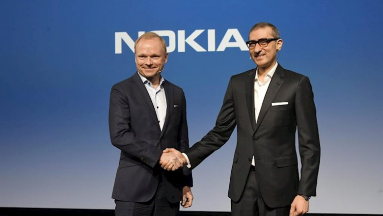 ep pekka lundmark izquierda estrecha la mano de su predecesor en la presidencia de nokia rajeev suri ep pekka lundmark izquierda estrecha la mano de su predecesor en la presidencia de nokia rajeev suri