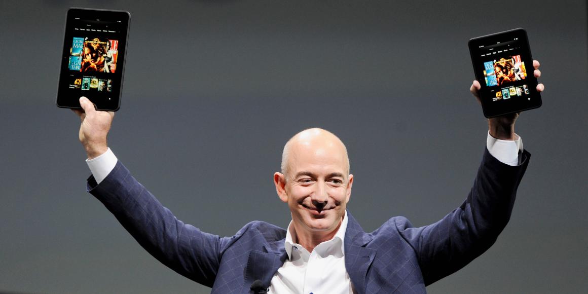 amazon-ceo-jeff-bezos-holds-new-kindle-fire-hd-7-and-kindle-fire-hd-89-l-during-amazons-kindle-fire-event-santa-monica-california-september-6-2012